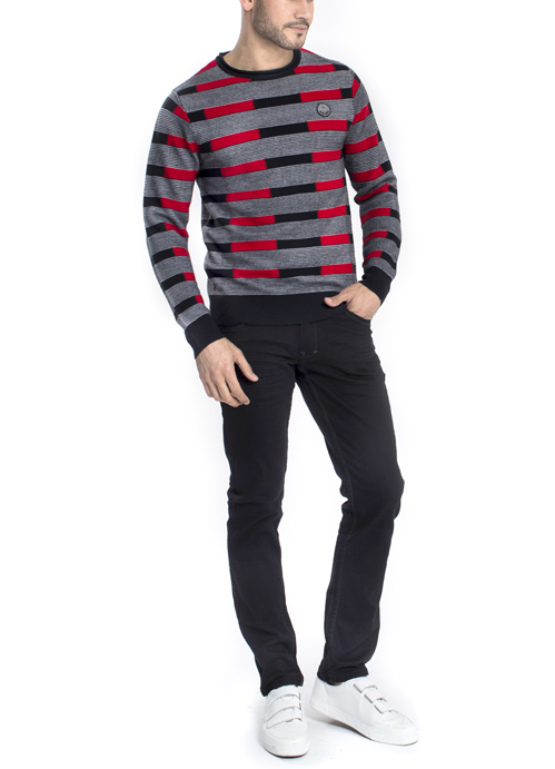 Model wearing red and black horizontal stripe long sleeve shirt with black pants.